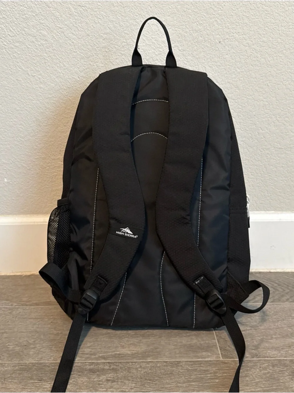 High Sierra Black and Gray Backpack with Blue and Orange Logo